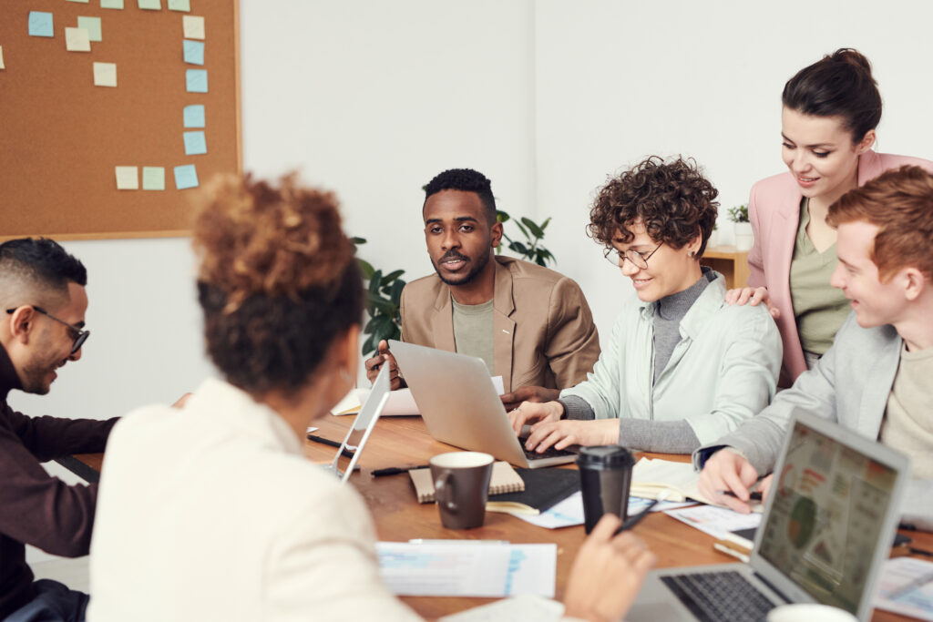 Staff working together at a table